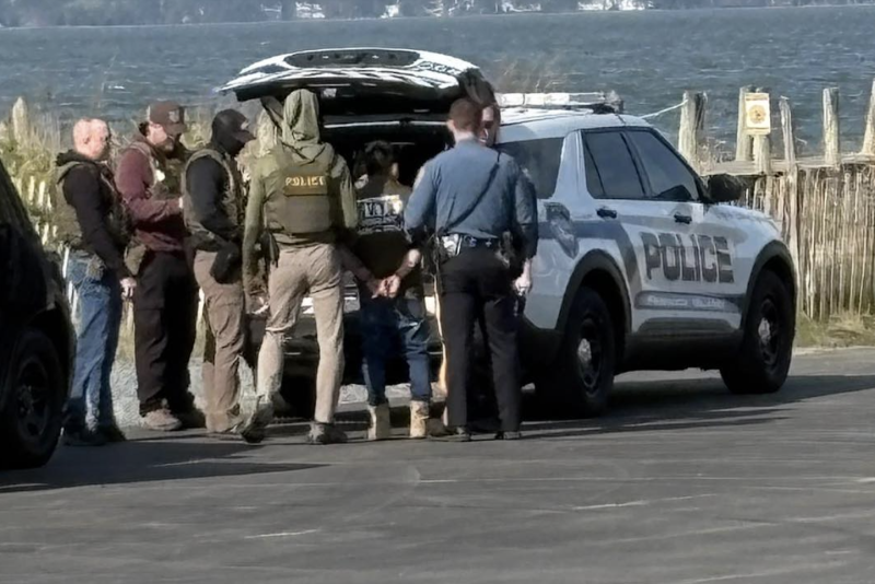 Federal ICE agents detain two people in Dewey Beach on the morning of April 22. PHOTOS COURTESY OF PHIL WINKLER